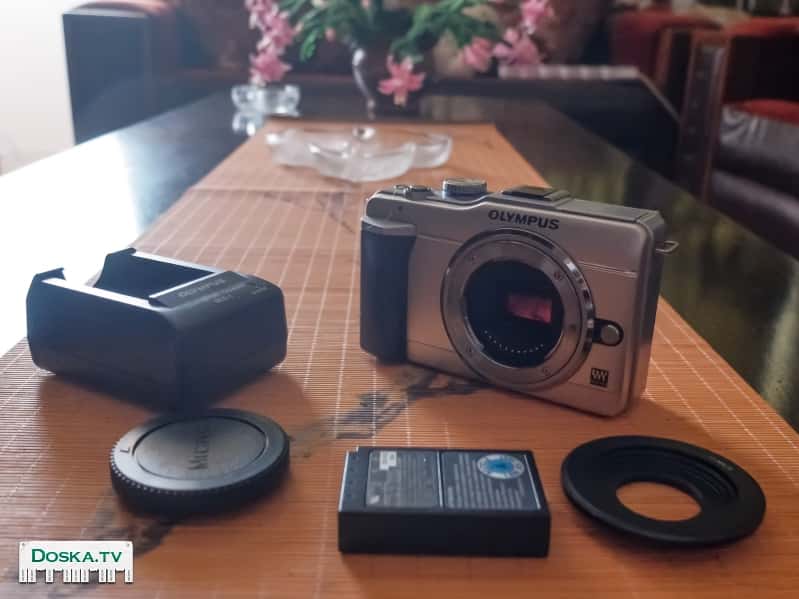 Olympus E-PL1  * большой сенсор 4/3 (мало шумов, большой