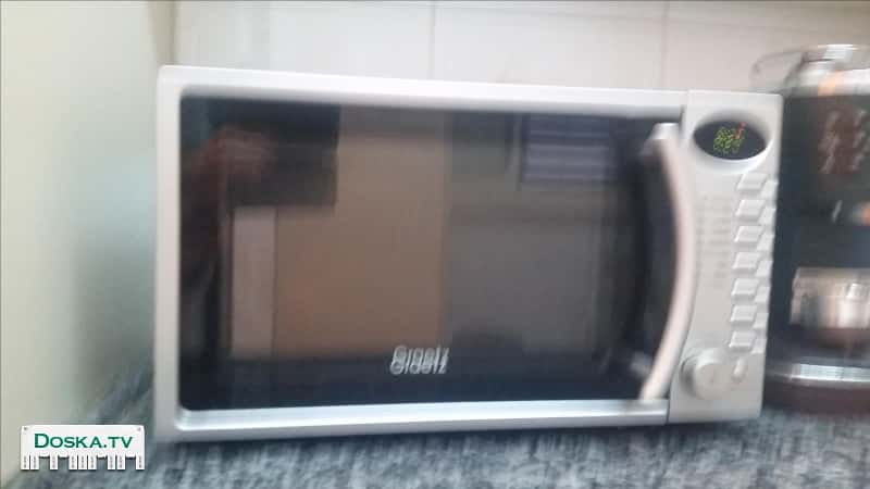 Микроволновая печь (гриль)с большим количеством функций.