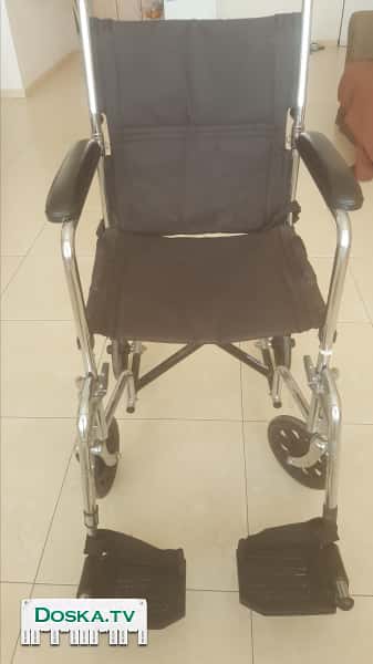 Инвалидная коляска-каталка в отличном состоянии.